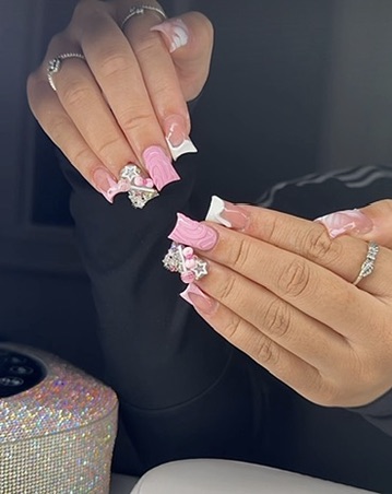 Pink and white nail set with floral charms