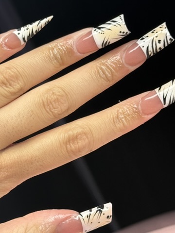 White square nails with black zebra print French tips