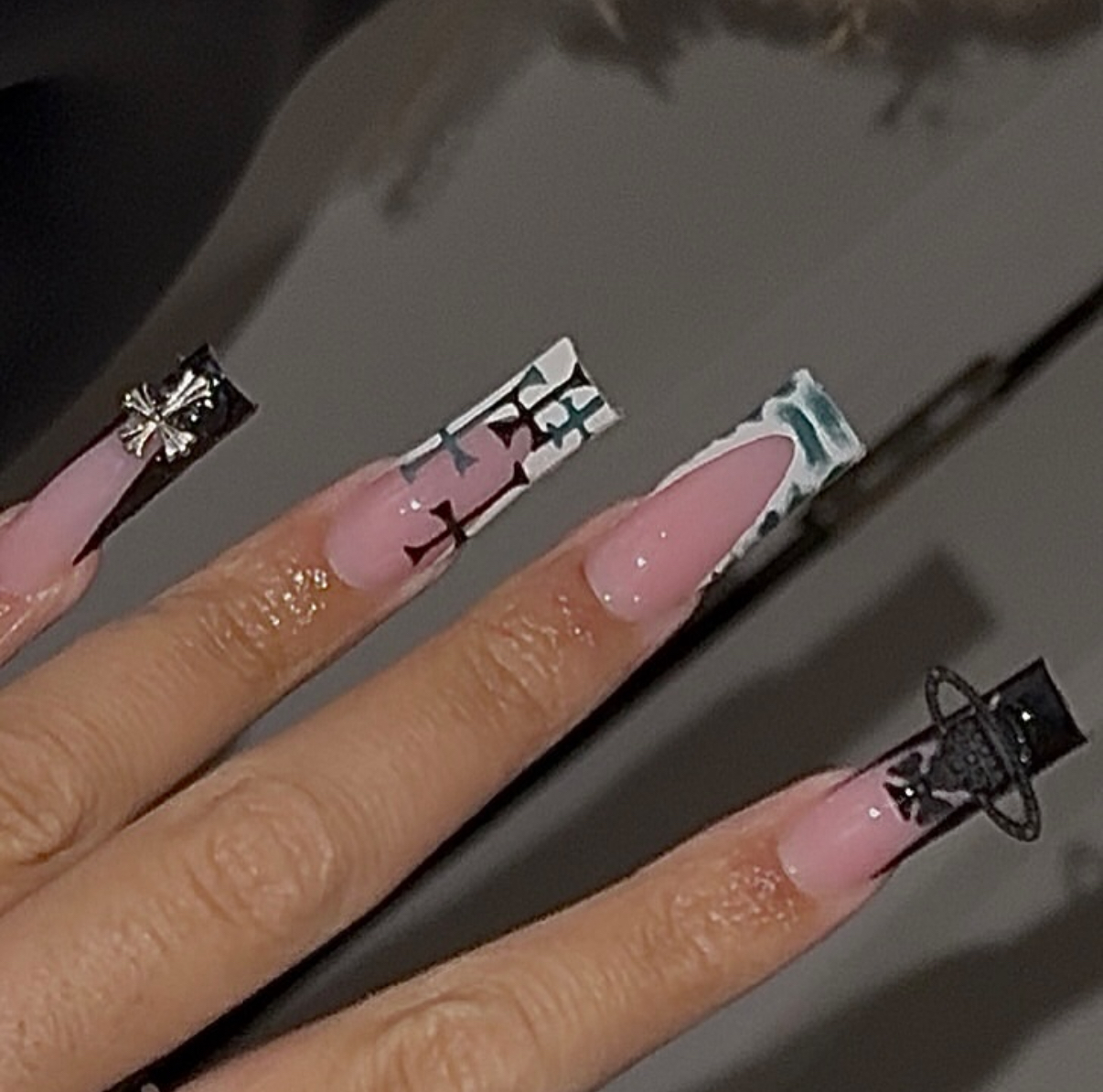 Long square graphic nail set with black tips and charms